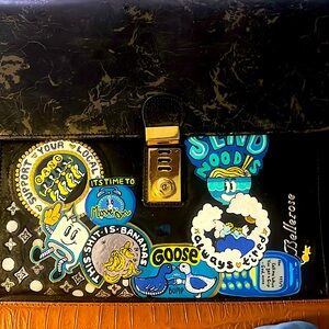 Vintage Black Briefcase with Colorful Graphic Stickers